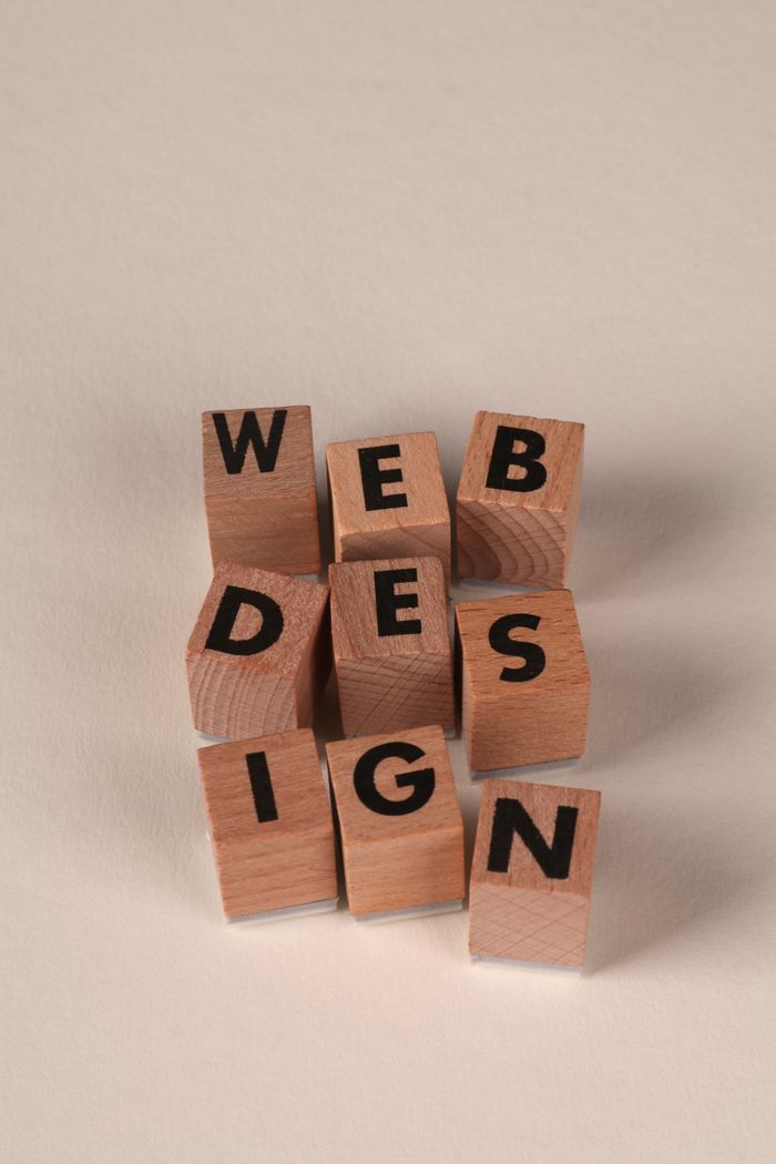creative-03 Wooden blocks set out to form Web Design. Ideal for creative, digital content themes.